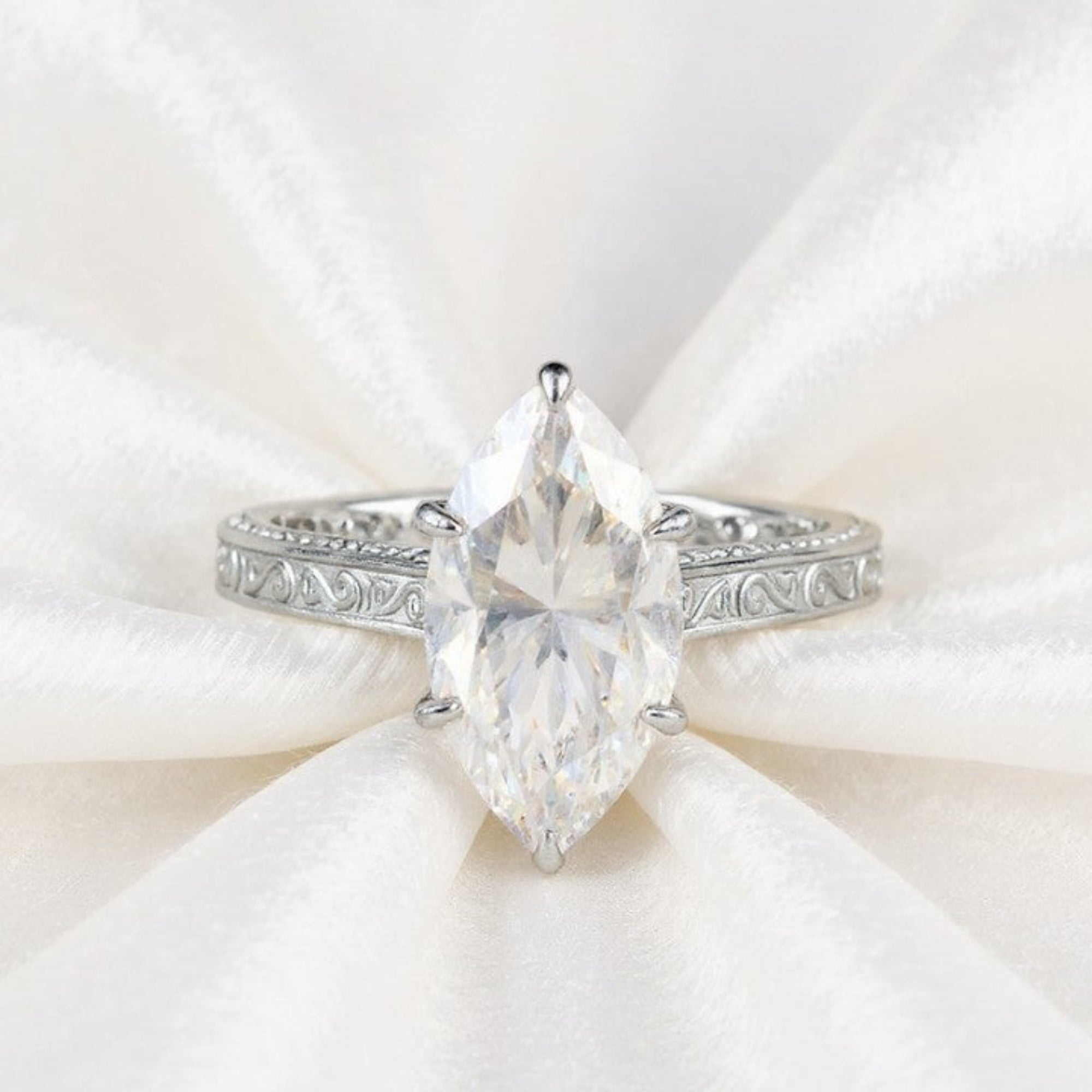 Lumea Moissanite Diamond Ring on White Silk Background