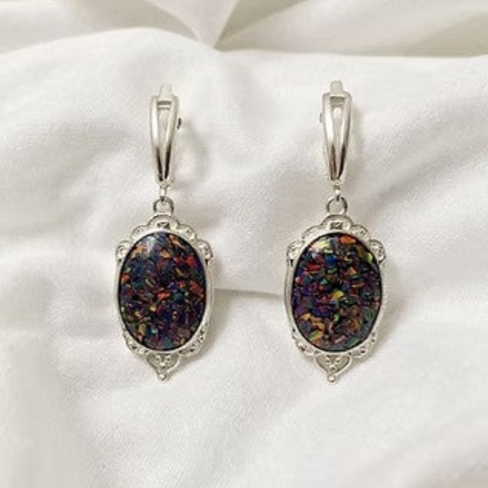 Mini Victorian Earrings on White Silk Background