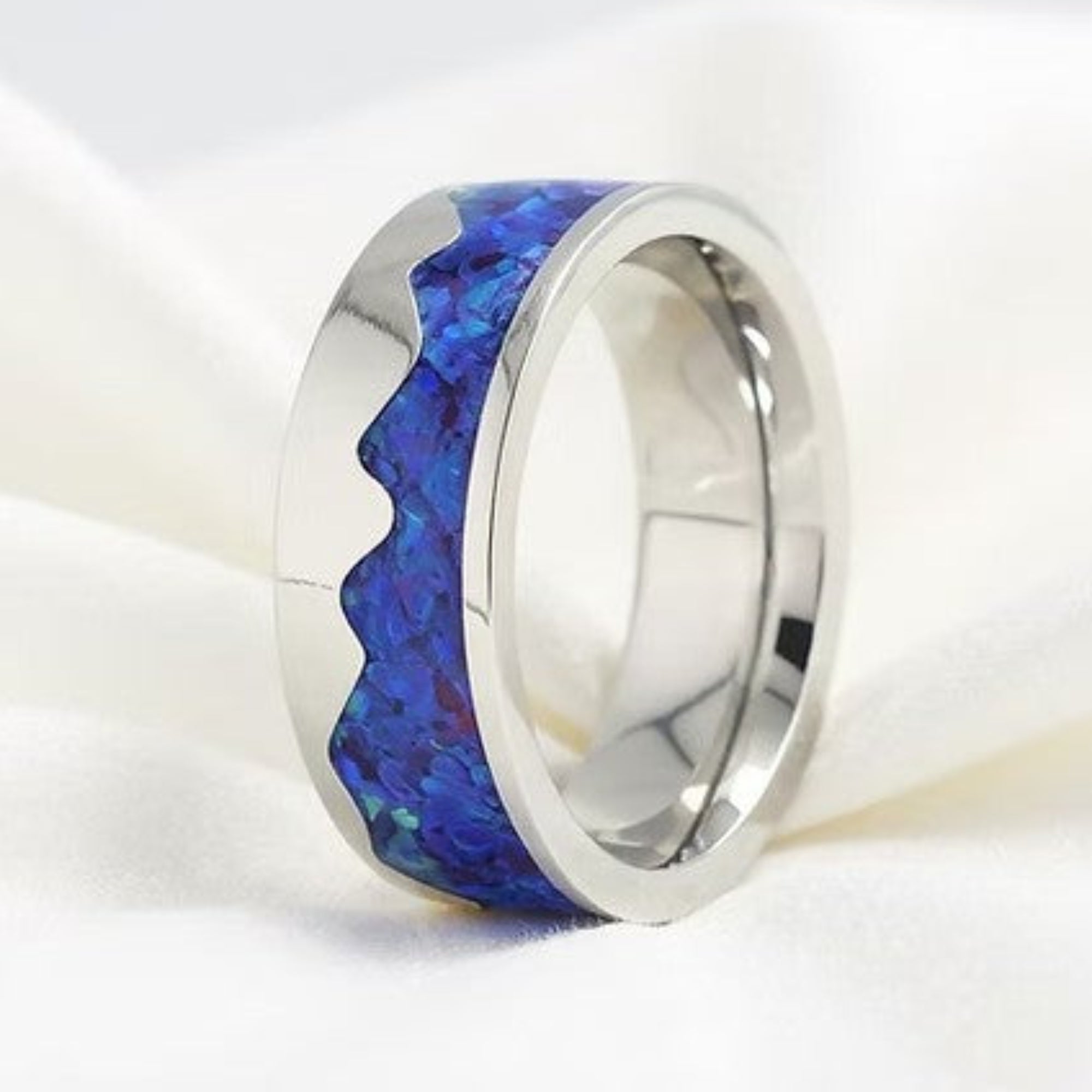 Rocky Mountain Opal Ring 6MM Stainless Steel on Silk White Background